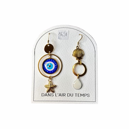 Boucles d’oreilles asymétriques Dans l’air du temps